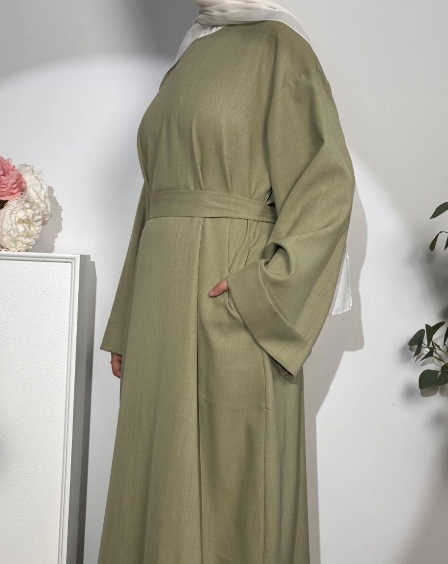 (Pre-order) Sage Green Linen Abaya With Pockets - Premium Abaya’s from Sahara Soireé - Just €70! Shop now at Sahara Soirée